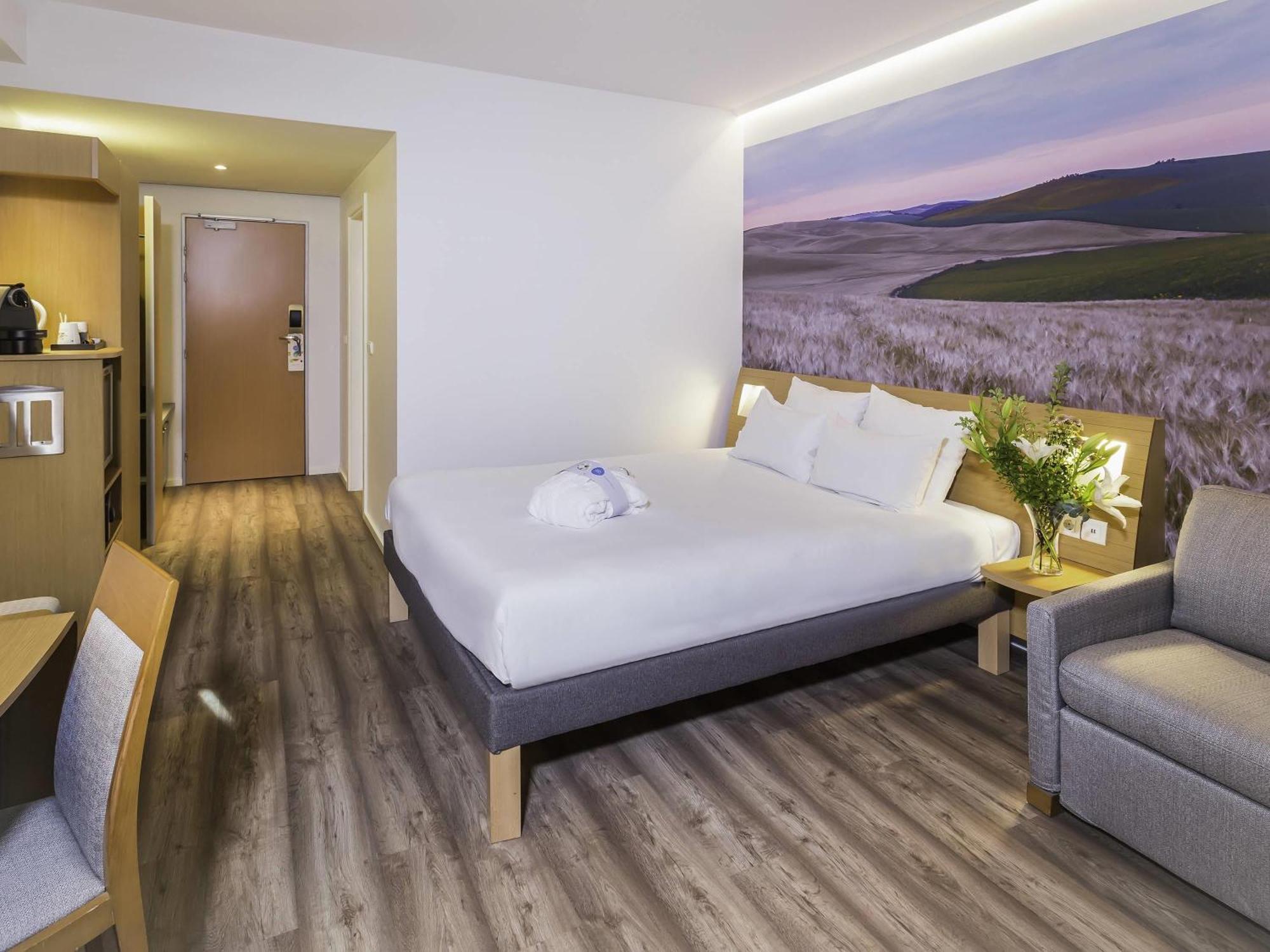 Camera Queen Executive con Divano-Letto